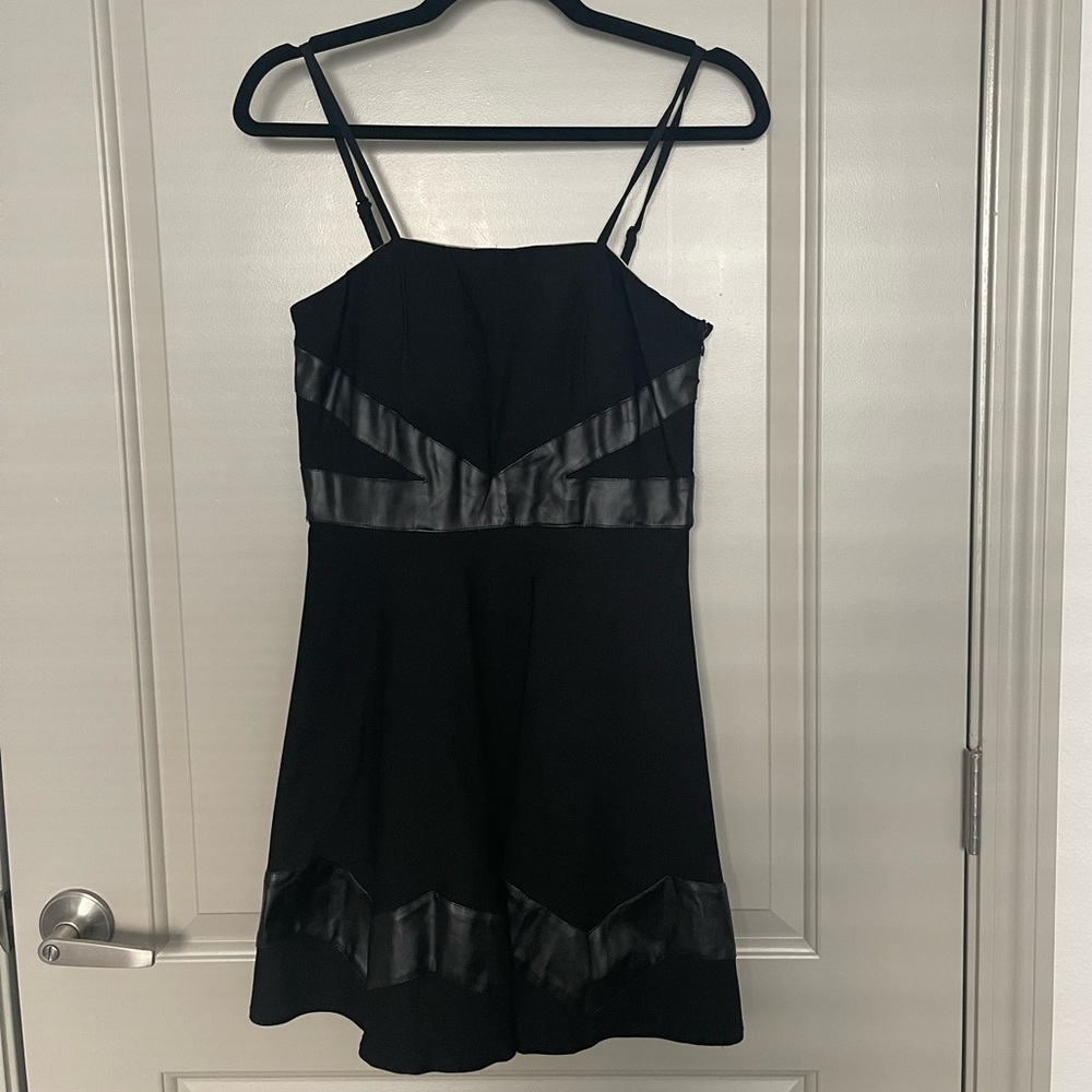 Black spaghetti strap dress with leather accents